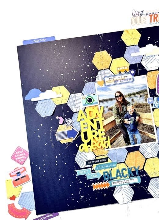 Scrapbook layout: Navy/yellow hexagon 'Explore' layout, April 2026 kit